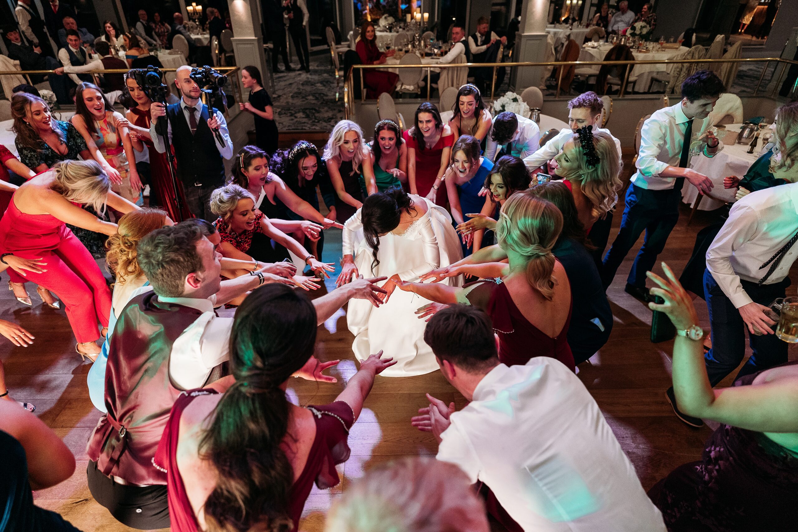 A group having a Wedding dance party