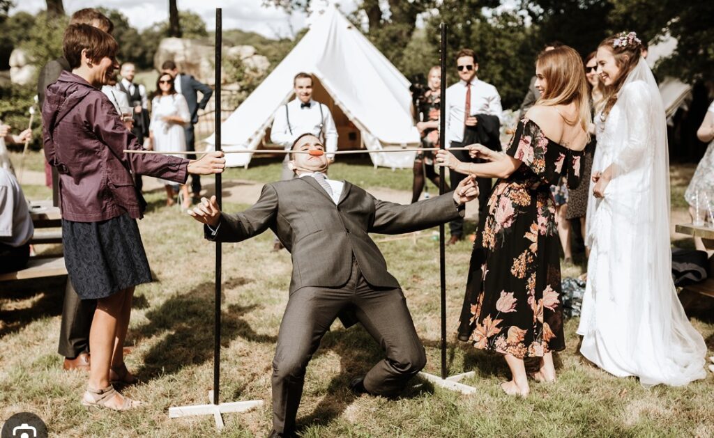 A group laughing and participating in wedding party activities