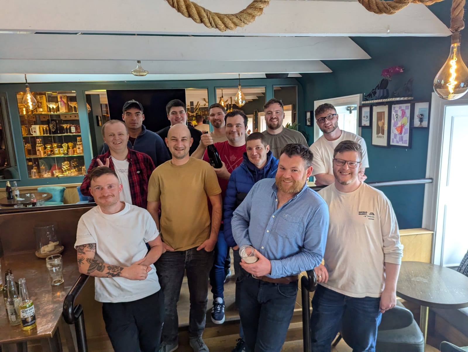 A stag party posing for a photo