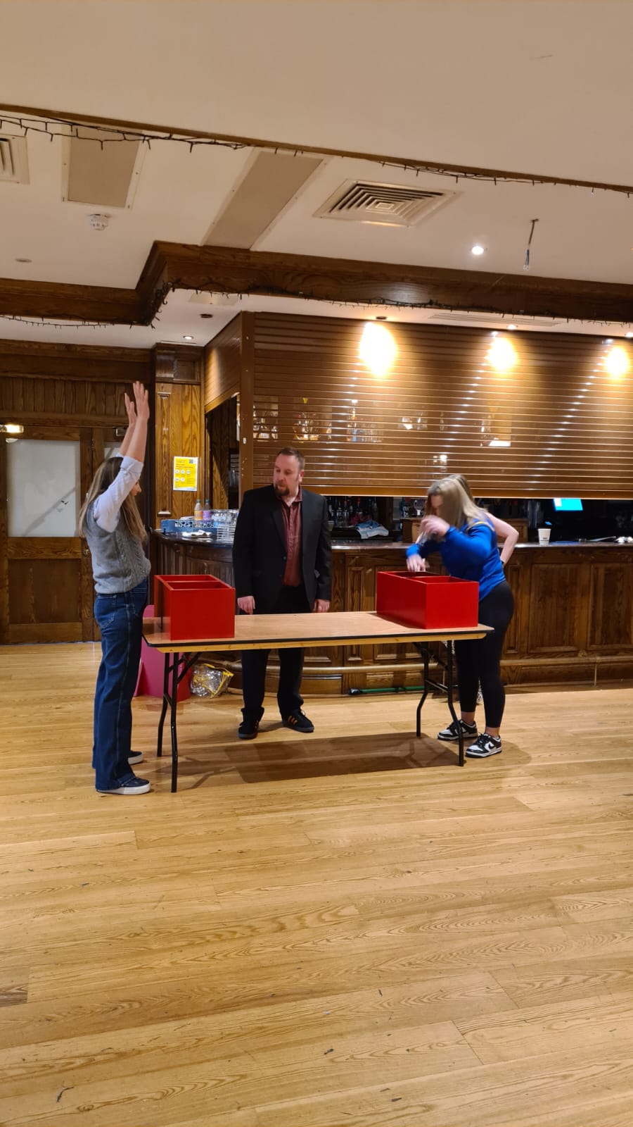 A group of people participating in "The Cube"